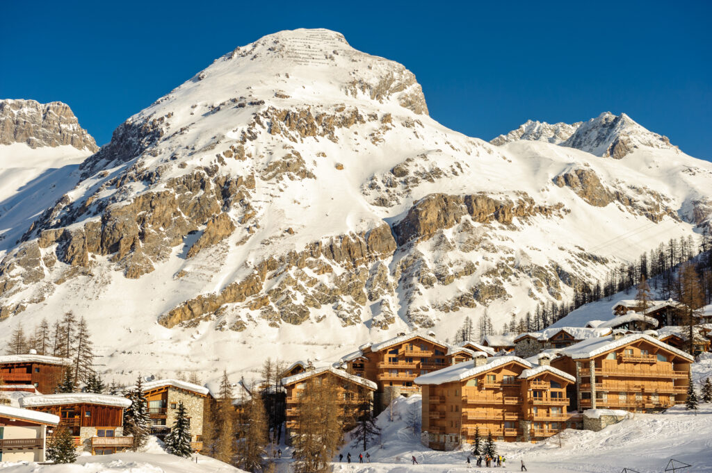 Alpine winter mountain landscape. French Alps covered with snow in sunny day. Val-d'Isere, France